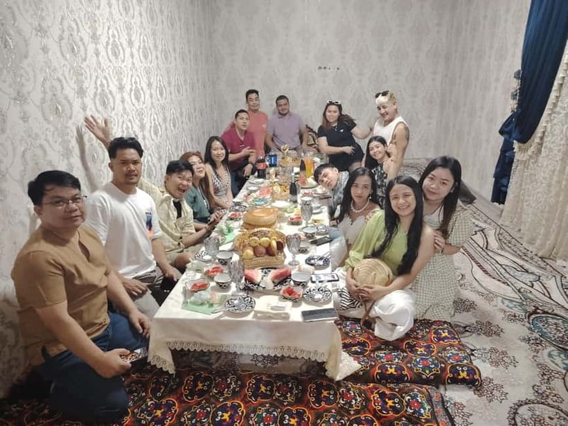 cooking traditional food in Samarkand with local people - Plov, salads, and the heat of the o’choq