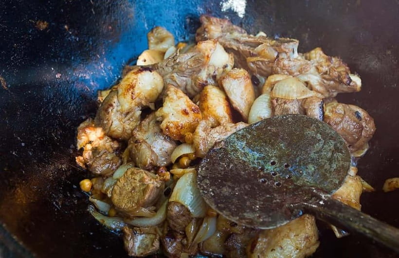 Plov and Samsa Cooking Class in Tashkent - A home setting with tea and small treats