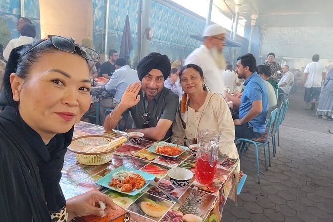 Ten Bites Adventure Food Tour in Tashkent - Kukeldash Madrasah and food with context